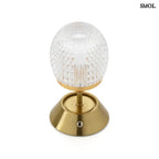 Sárgaréz talpú, kristályhatású, fazettált üveg búrával ellátott, hordozható, tölthető LED asztali lámpa felülről