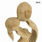 Fa szobor - ölelkező pár | LOMANI | SMOL - csók nagyítva