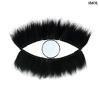 Falitükör fekete fűből, ovális formában, természetes anyagból készült, fehér háttérrel