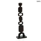 Karakteres fekete gyertyatartó aszimmetrikus, totemszerű formával, elforgatva