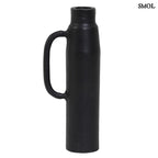 Modern fém váza és gyertyatartó matt fekete színben, fehér háttérrel