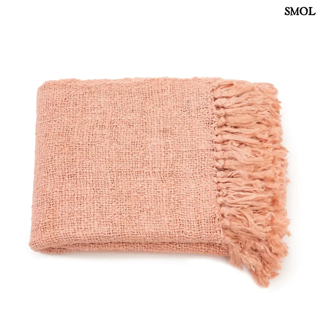 Lazacrózsaszín kézzel szőtt pamut pléd waffel textúrával, összehajtva