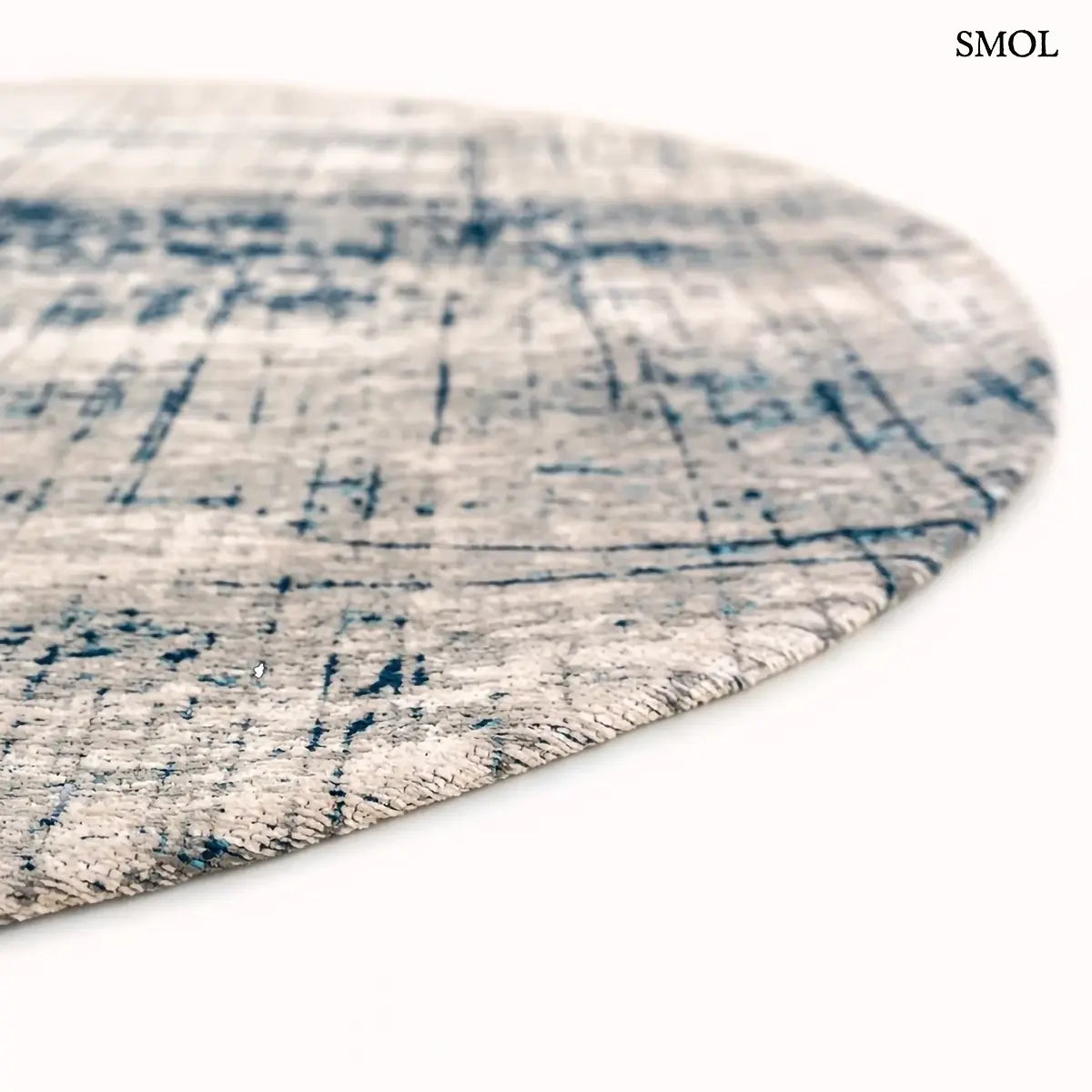 ECO RUG BRONX AZURITE azuritkék absztrakt szőnyeg 60-as évek grafikus mintával, lapos szövés, 3 mm – kül- és beltéri, kerek formában, oldalról