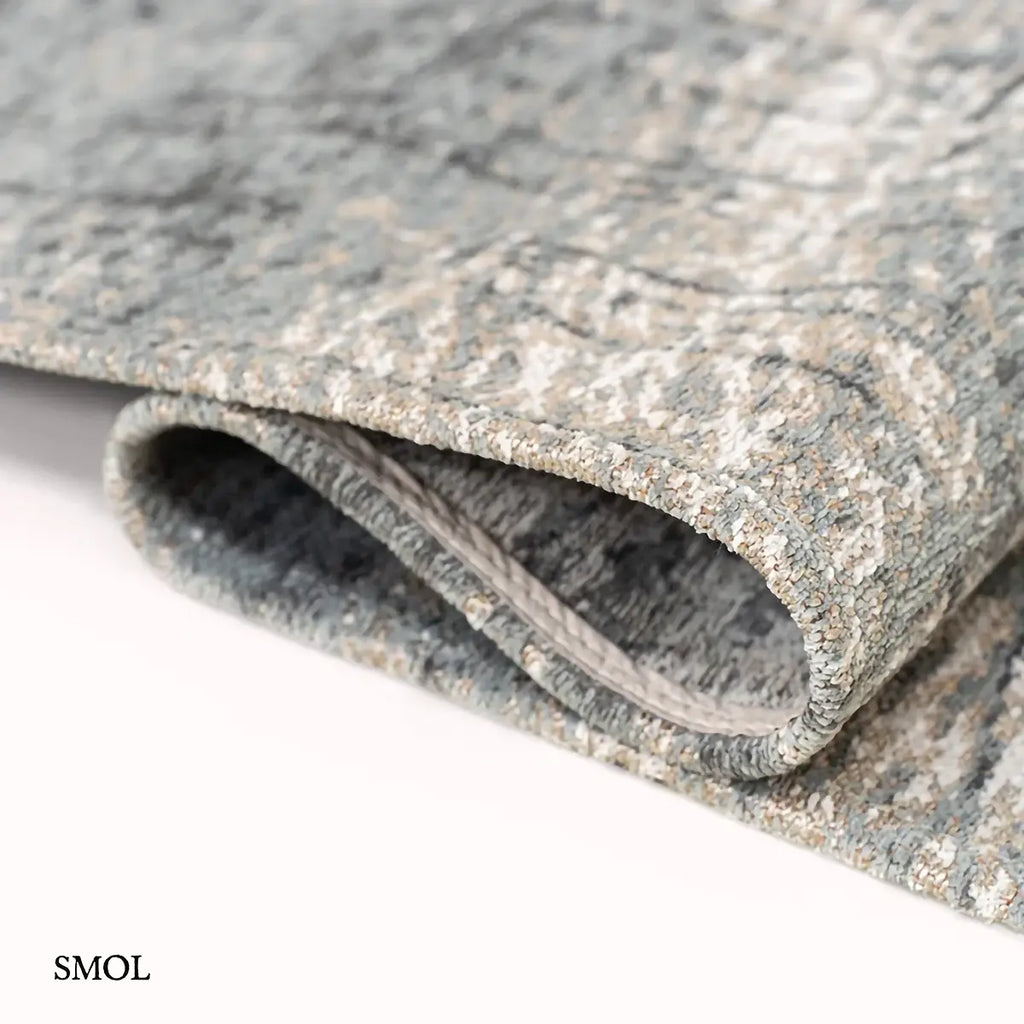 ECO RUG JERSEY STONE kőszürke absztrakt szőnyeg 60-as évek grafikus mintával, lapos szövés, 3 mm – kül- és beltéri, hullámosra hajtogatva