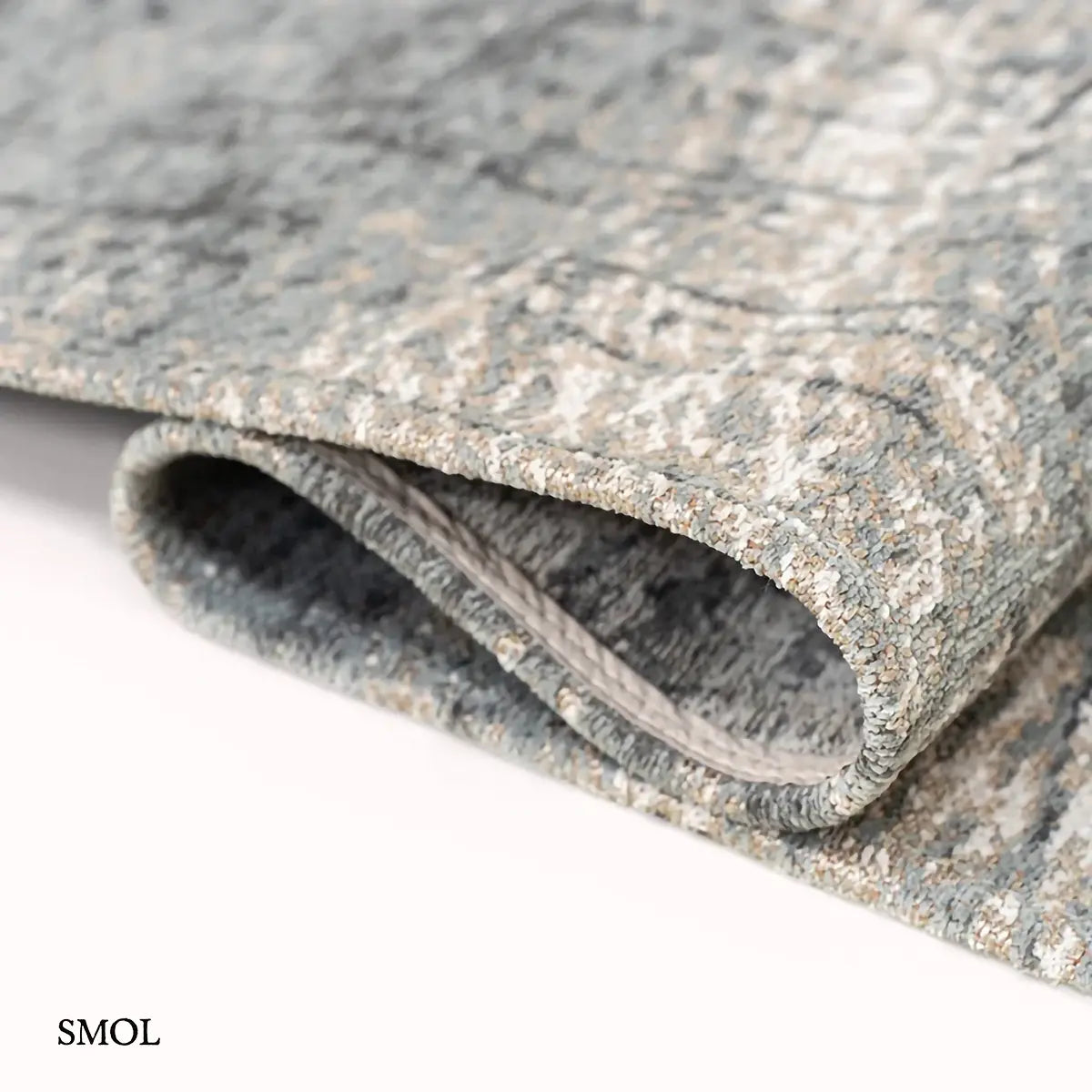 ECO RUG JERSEY STONE kőszürke absztrakt szőnyeg 60-as évek grafikus mintával, lapos szövés, 3 mm – kül- és beltéri, hullámosra hajtogatva