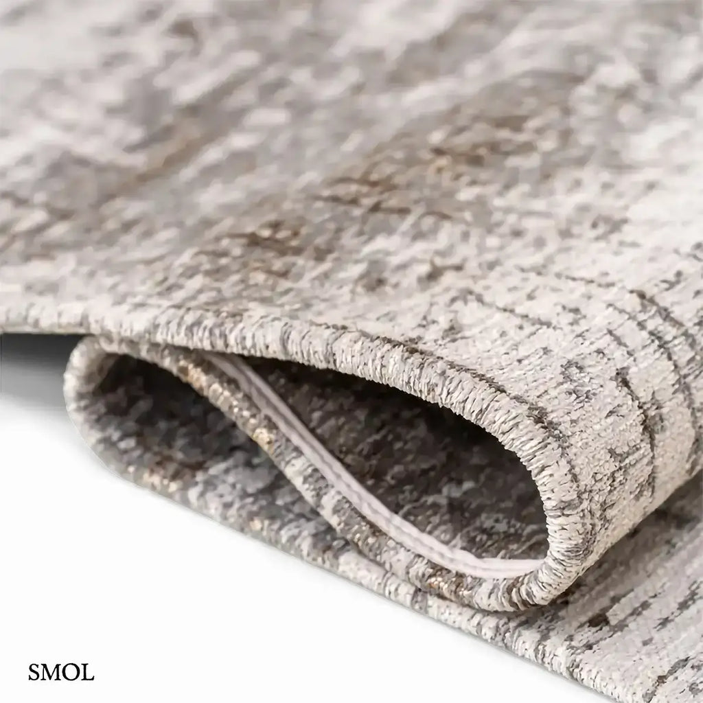 ECO RUG CONCRETE JUNGLE szürke absztrakt mintás szőnyeg, hullámosra hajtogatva
