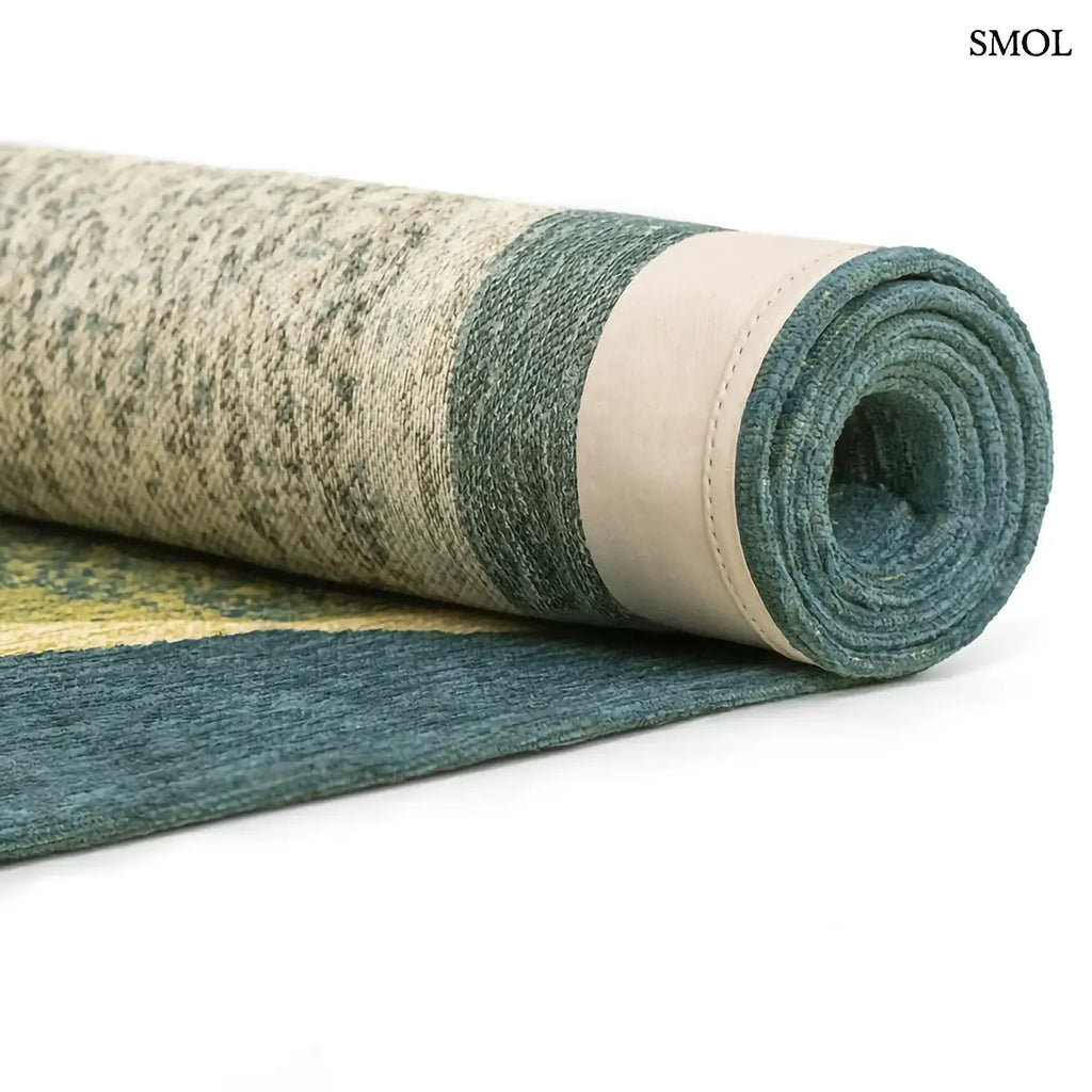 ECO RUG MARBLE LARCH zöld-türkiz absztrakt szőnyeg kavics ihlette lebegő formákkal, lapos szövés, 3 mm – kül- és beltéri, feltekerve