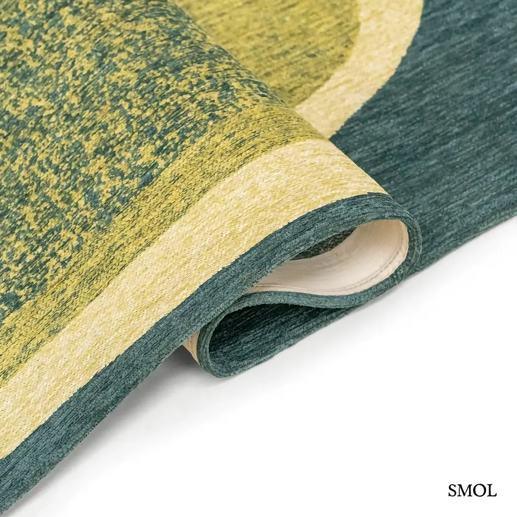 ECO RUG MARBLE LARCH zöld-türkiz absztrakt szőnyeg kavics ihlette lebegő formákkal, lapos szövés, 3 mm – kül- és beltéri, hullámosra hajtogatva