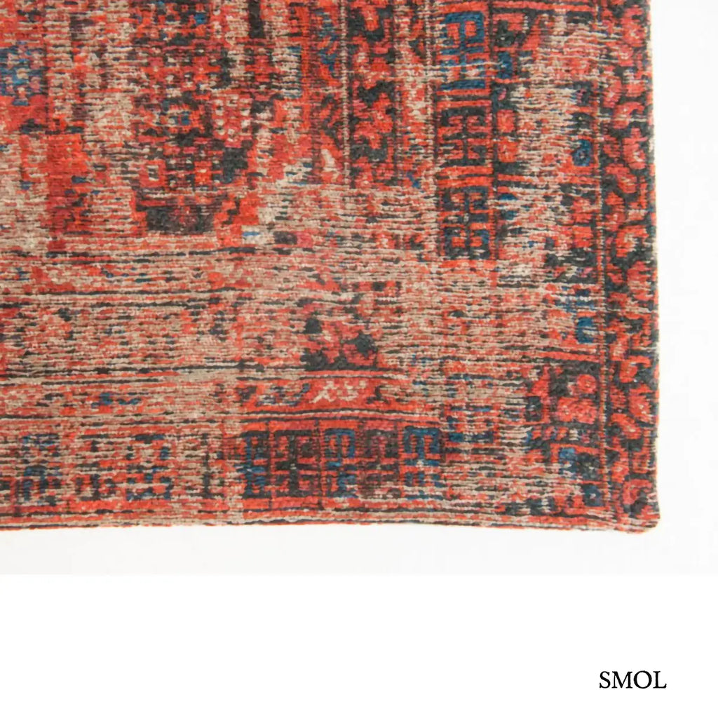 ECO RUG RED BRICK afgán mintás szőnyeg téglavörös alapon sötétkék Hadschlu mintával, koptatott vintage hatással, széle nagyítva