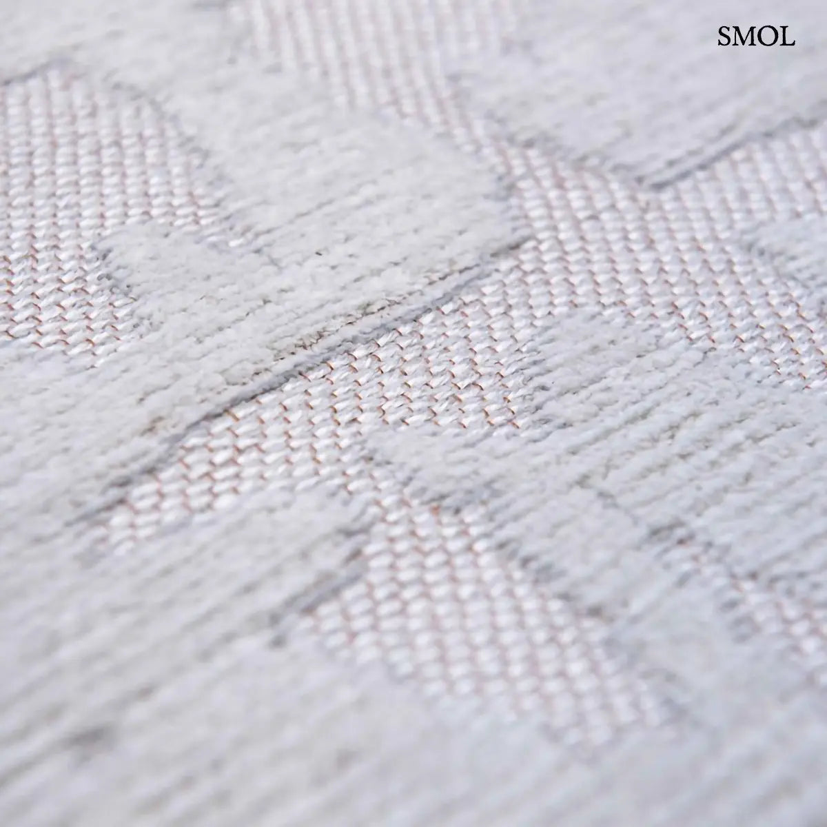 ECO RUG TSINGY OYSTER baobab mintás szőnyeg ezüstszürke tónusokban, halvány kéregszerű afrikai textúrával, minta nagyítva