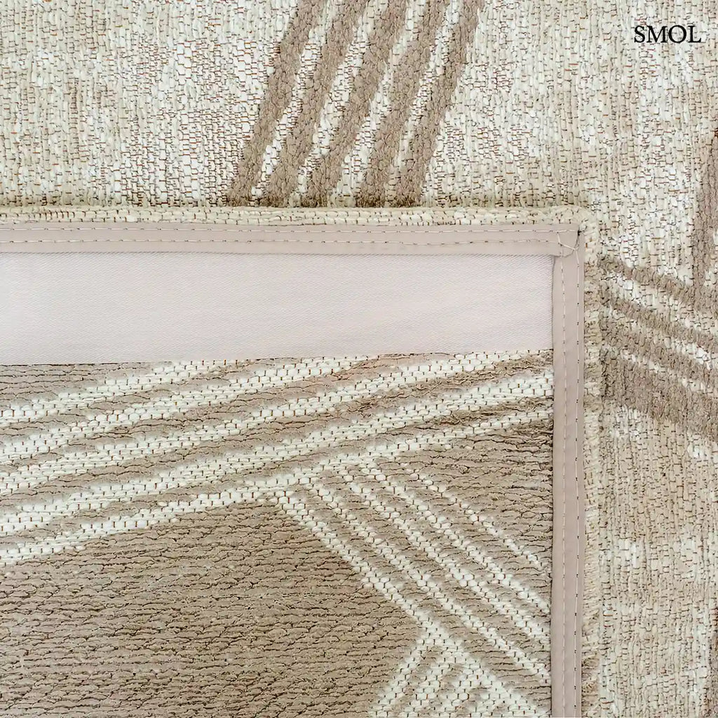 ECO RUG DUNE kalligráfia mintás szőnyeg krém alapon taupe ecsetvonásos mintával, felhajtott sarokkal