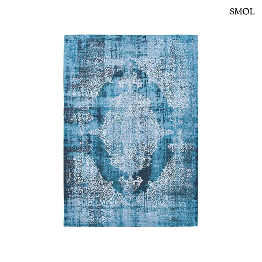 ECO RUG STORM medaillon mintás szőnyeg kék tónusokban, vintage hatással, foltos vízfestmény felülettel, fehér háttérrel