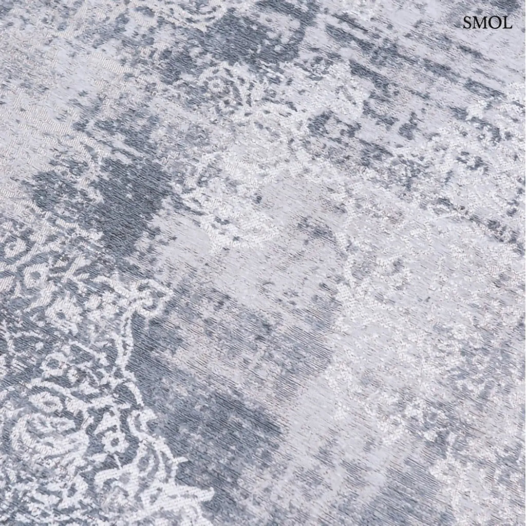 ECO RUG QUARTZ medaillon mintás szőnyeg szürke tónusokban, vintage hatással, foltos vízfestmény felülettel, minta felülről