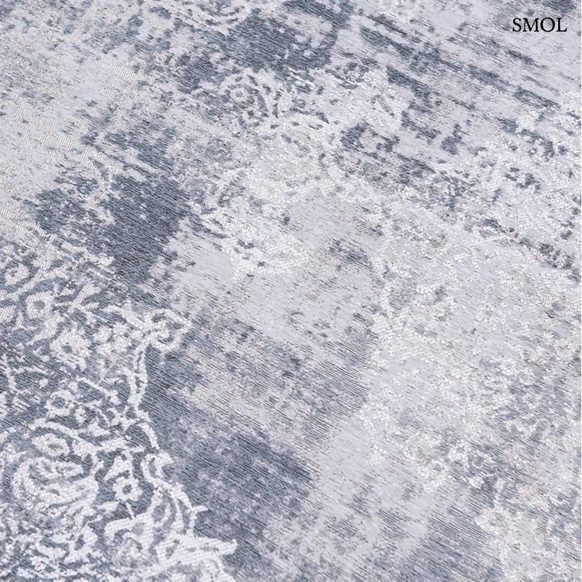 ECO RUG QUARTZ medaillon mintás szőnyeg szürke tónusokban, vintage hatással, foltos vízfestmény felülettel, minta felülről