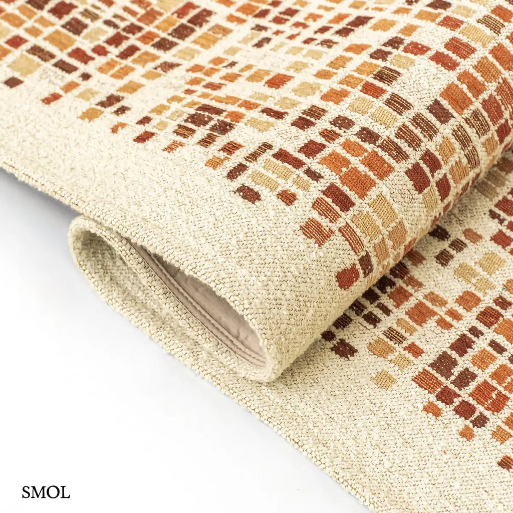 ECO RUG PUMPKIN narancs mozaikos mintás szőnyeg, hullámosra hajtogatva