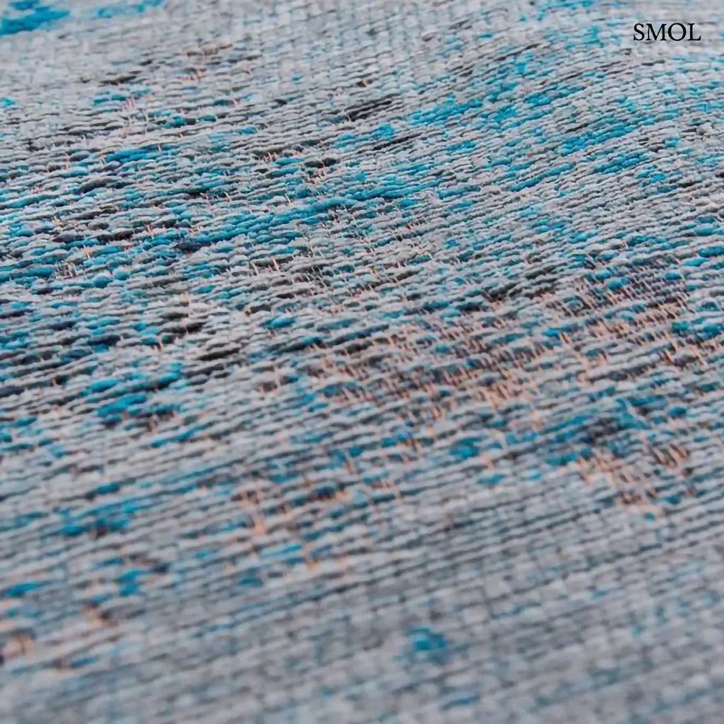 ECO RUG GREY TURQUOISE perzsa mintás szőnyeg szürke alapon türkiz medallion mintával, koptatott vintage hatással, textúra nagyítva