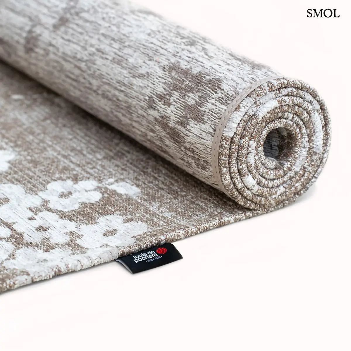 ECO RUG MORNING MIST sakura mintás szőnyeg barna-szürke alapon, fehér cseresznyevirág motívumokkal, feltekerve