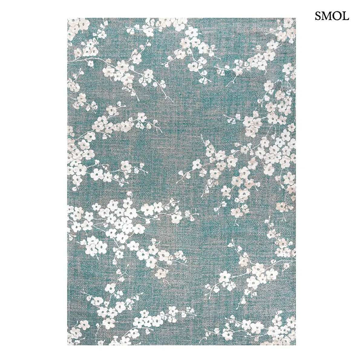 ECO RUG LAKE BLUE sakura mintás szőnyeg türkizkék alapon fehér-krém cseresznyevirág ágakkal, fehér háttérrel
