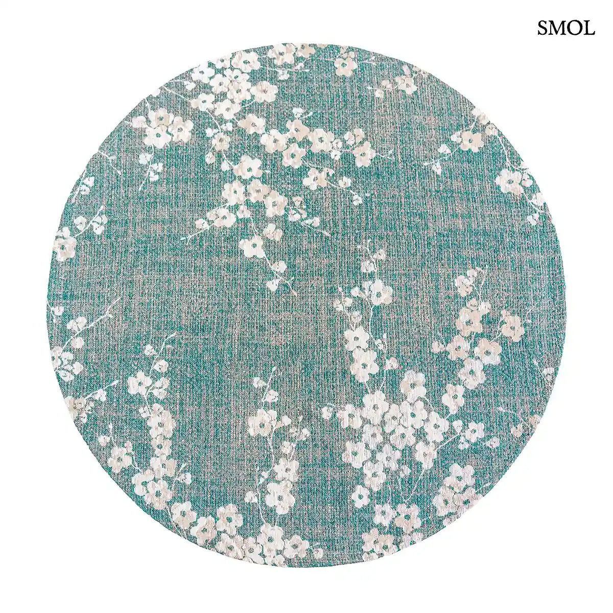 ECO RUG LAKE BLUE sakura mintás szőnyeg türkizkék alapon fehér-krém cseresznyevirág ágakkal, kör alakban, fehér háttérrel