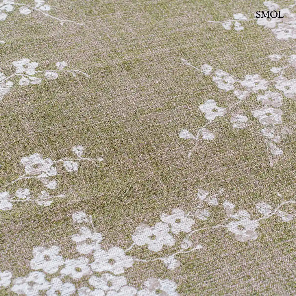 ECO RUG WET GARDEN zöld sakura mintás szőnyeg japán cseresznyevirág motívumokkal, lapos szövés, 3 mm – kül- és beltéri, minta nagyítva