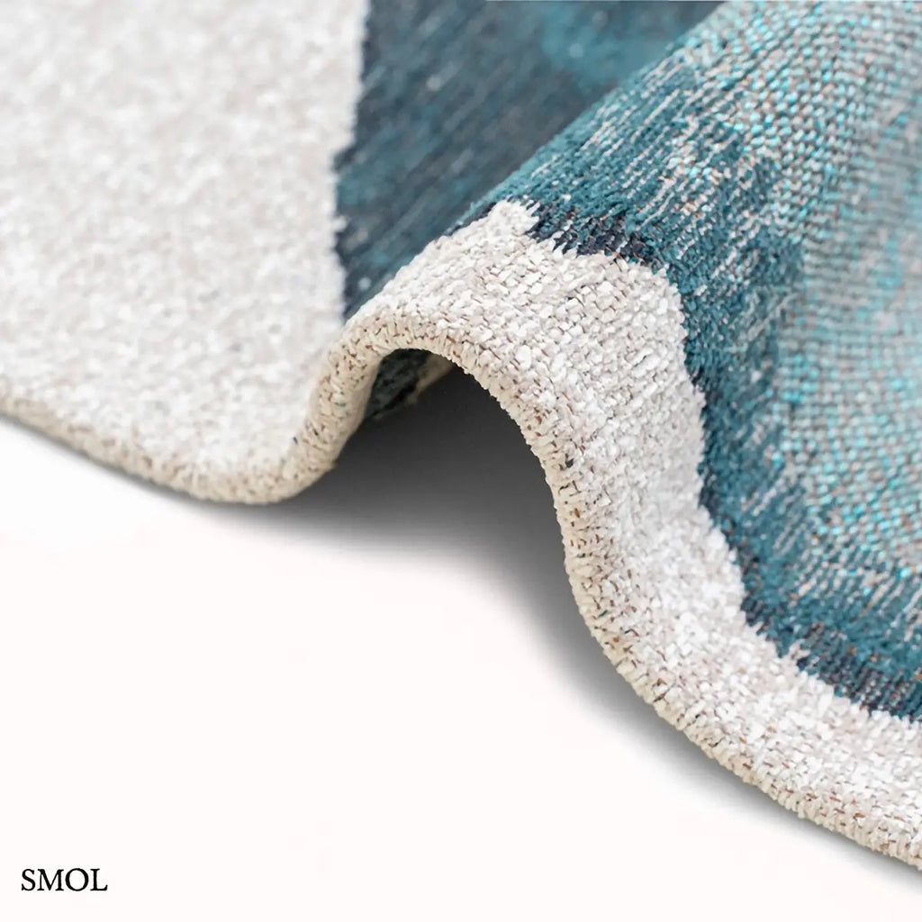 ECO RUG INKJET tintafolt mintás szőnyeg fehér alapon türkiz-kék absztrakt vízfestmény hatással, vastagság nagyítva