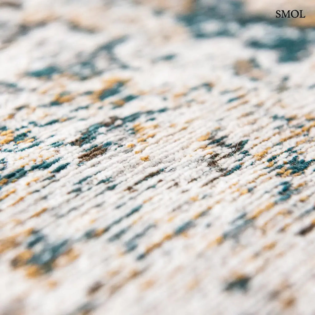ECO RUG FENER virágos perzsa mintás szőnyeg mustár-türkiz kombinációban, koptatott Bakhtiari motívumokkal, közelről