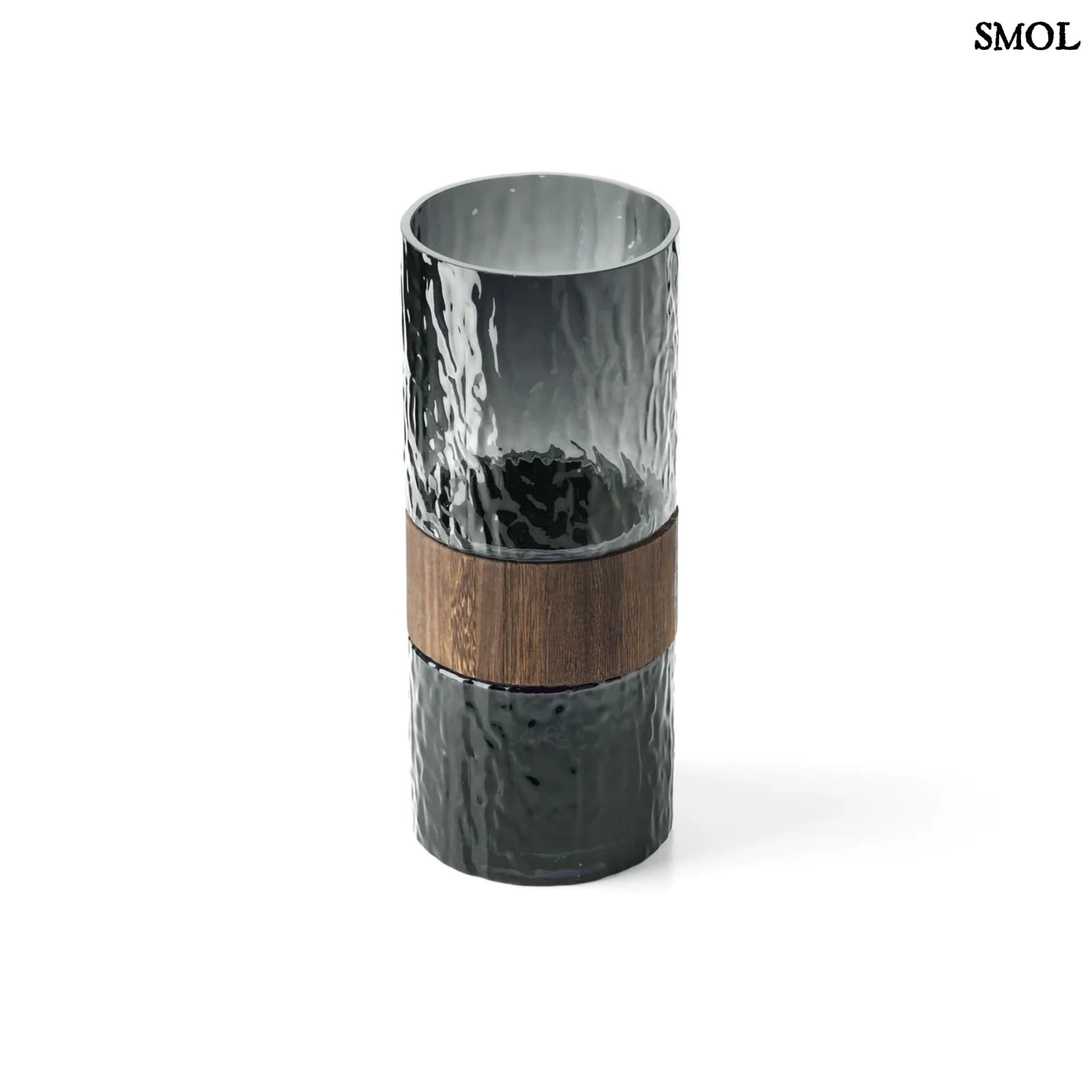 Sötétszürke váza üvegből, középen fa berakással, modern díszítőelem, felülről