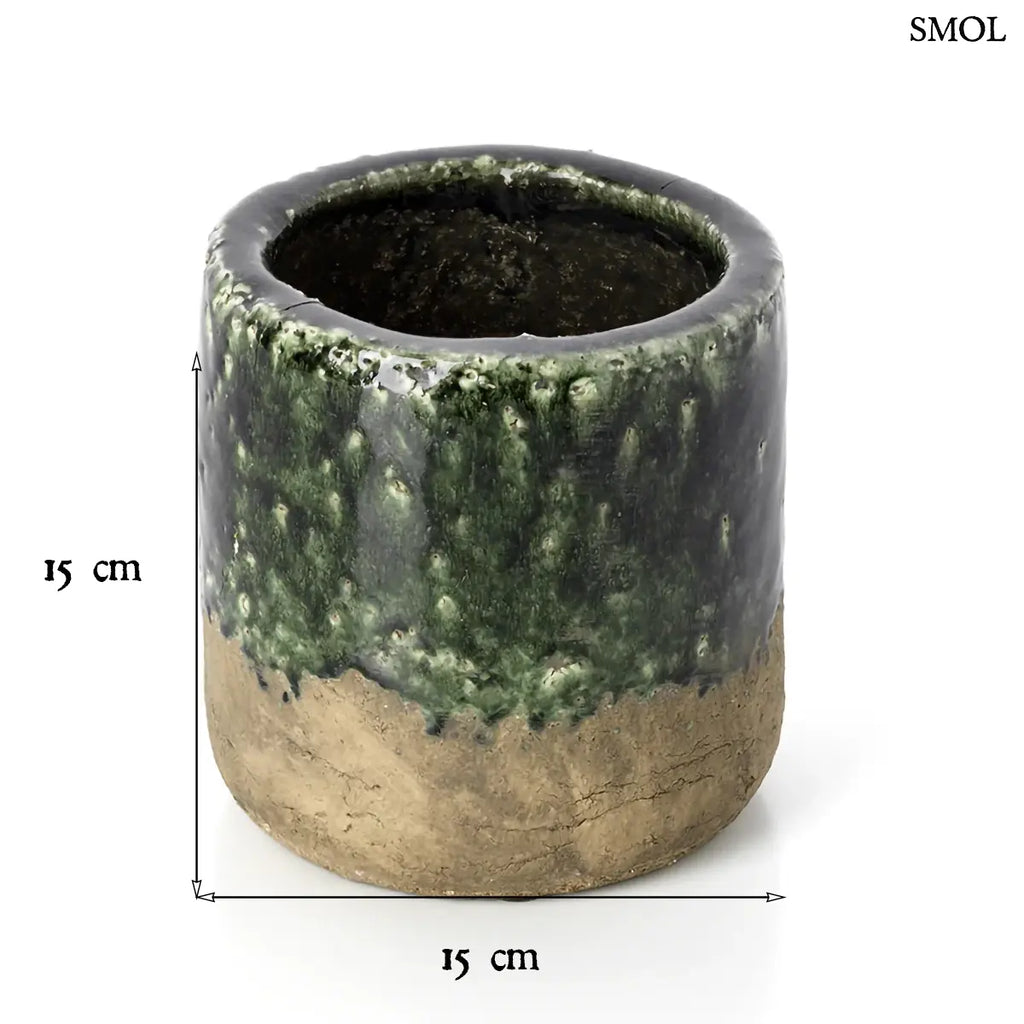 Rusztikus, henger alakú kerámia kaspó, alsó részén nyers barna agyaggal, felső részén pedig sötétzöld, rücskös mázzal, méretekkel