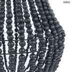 Fekete fagolyós csillár kézzel fűzött fagyöngyökkel és csepp alakú függőlámpa kialakítással, oldalról nagyítva