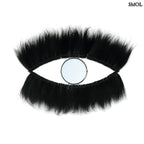 Falitükör fekete fűből, ovális formában, természetes anyagból készült, fehér háttérrel