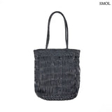 Braided leather bag - black | HAUTE TOTE