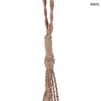 Kézzel készített kagylós dekoráció natúr kötélen függő conch kagylókkal, kötél nagyítva