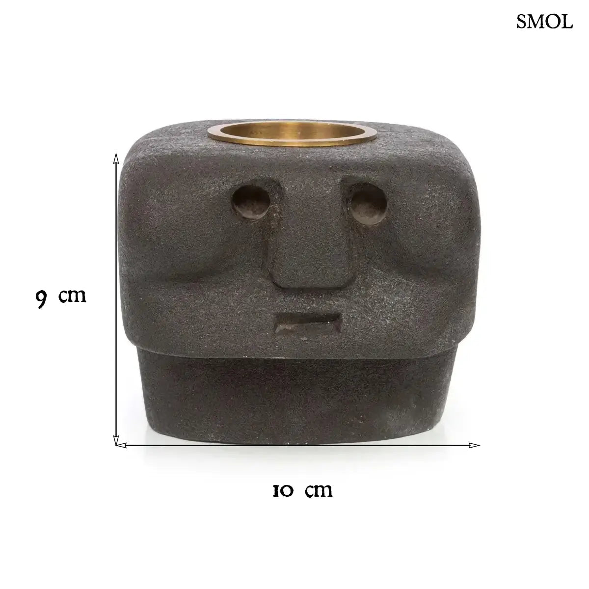 Kézzel faragott fekete kő mécsestartó misztikus arc szobor formában, sárgaréz betéttel, méretekkel