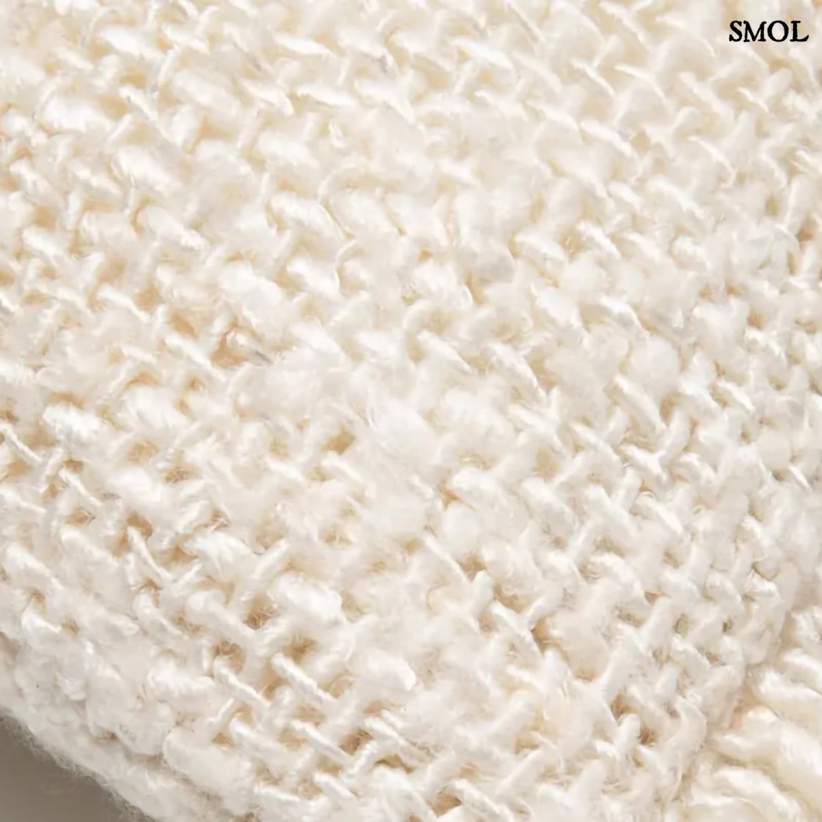 Krémszínű texturált díszpárnahuzat textúra nagyítva