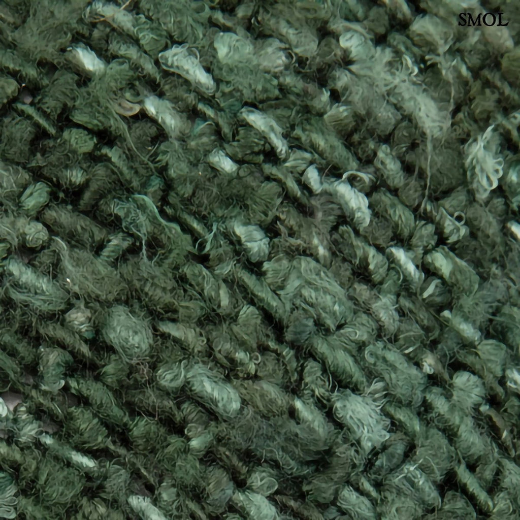 Zöld díszpárnahuzat textúra nagyítva