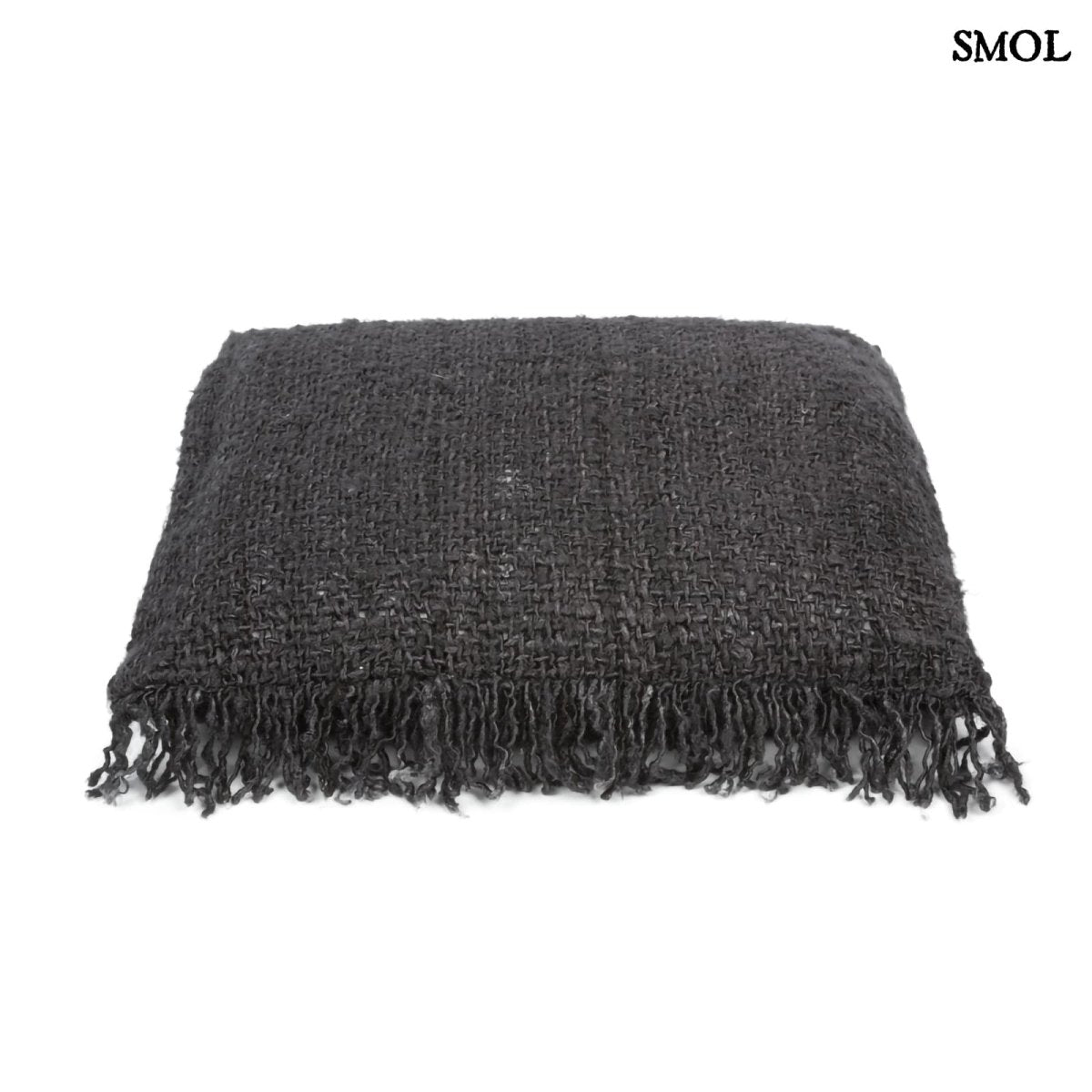 Rojtos, fekete-kék árnyalatú díszpárnahuzat fektetve