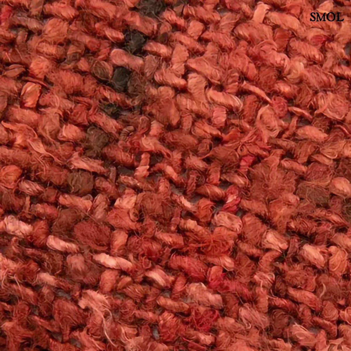 Cseresznyepiros boho stílusú díszpárnahuzat textúra nagyítva