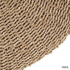 Természetes szizál szőnyeg kerek formában, kézzel font textúrával, homokszínű boho stílusban, széle nagyítva